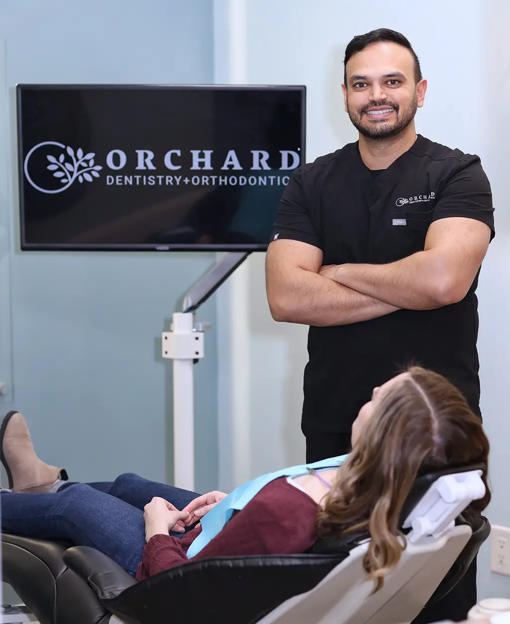 Brentwood Dentist, Dr. Patel with patient